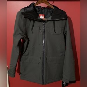 NWT 686 Level Jacket, size men’s XS in Gunmetal.